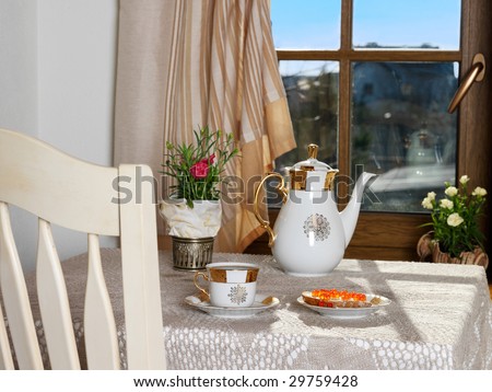 Romantic breakfast in an interior in the house on the sea