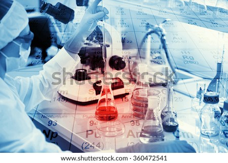 Science, chemistry, technology, biology and people concept - young female scientist mixing reagents from glass flasks and making test or research in clinical laboratory with chemical table background