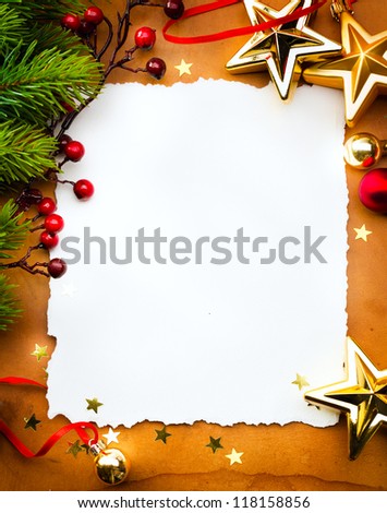 Design a Christmas greeting card with white paper on a red background