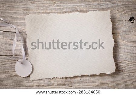 art Notice card, white paper on wood background