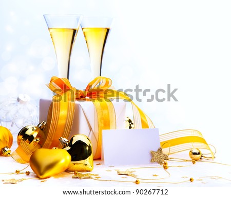 Christmas greeting card ( glasses of champagne vine and Christmas gifts, New Year party )