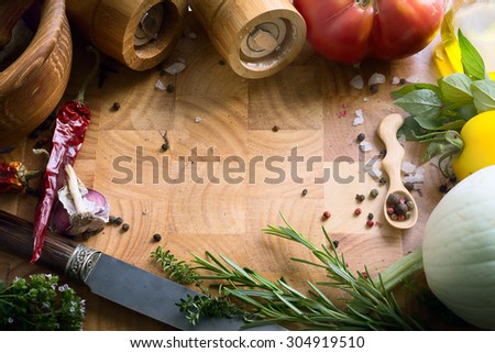 art fresh vegetables and spices on the wooden background; food recipes