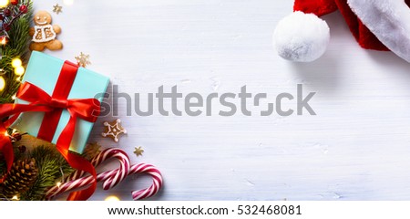 Christmas holidays composition on white wooden background with Christmas tree decoration and copy space for your text.