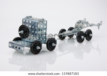 truck tractor toy - metal kit for construction on white background