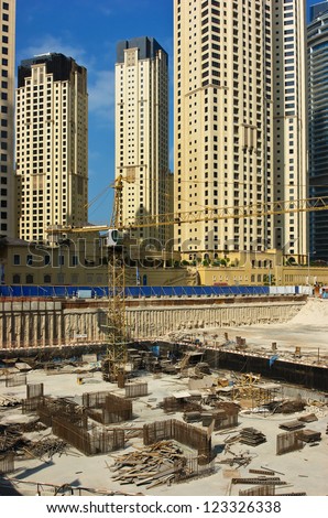 DUBAI, UAE - NOVEMBER 16: Dubai Marina construction site for a modern building, on November 16, 2012, Dubai, UAE. In the city of artificial channel length of 3 kilometers along the Persian Gulf.