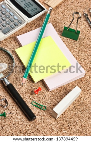 stationery in a mess on the table