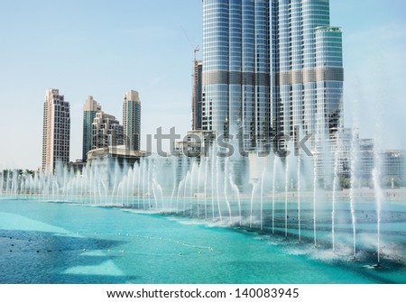 Dubai, Uae - November 14: The Dancing Fountains Downtown And In A Man-Made Lake In Dubai, Uae On November 14, 2012. The Dubai Dancing Fountains Are World\'S Largest Fountains With Height 150 M.