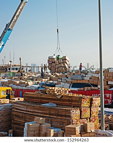 DUBAI, UAE-NOVEMBER 13: Loading a ship in Port Said on November 13, 2012 in Dubai, UAE. The oldest commercial port of Dubai