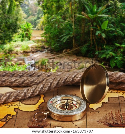 compass on map in tropical jungles