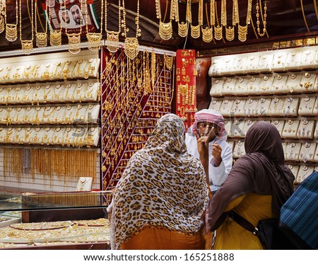 DUBAI, UAE - NOVEMBER 11: Gold market in Dubai on November 28, 2013, Dubai, UAE. The biggest market in Dubai. Women want to buy cheaper