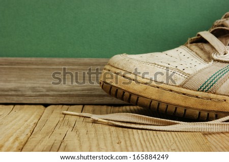old leather shoes on a wooden floor