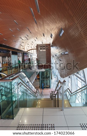 DUBAI, UAE - OCTOBER 31, 2013: Interior of metro station in Dubai. Metro as world\'s longest fully automated metro network (75 km).