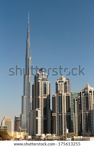 DUBAI, UAE - NOVEMBER 13: Modern buildings in Dubai, on November 13, 2013, Dubai, UAE. Dubai was the fastest developing city in the world between 2002 and 2008.