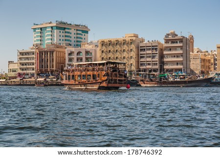 DUBAI, UAE-OCTOBER 30, 2013: Ship in Port Saeed in Dubai, UAE. The oldest commercial port of Dubai
