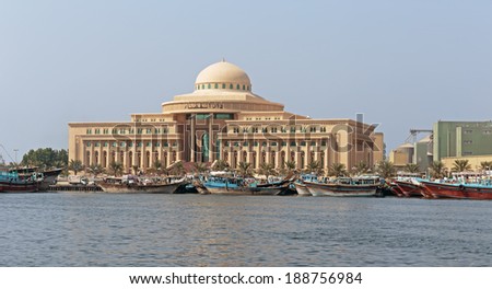 SHARJAH, UAE - OCTOBER 29, 2013: Sharjah - port. Sharjah is located along northern coast of Persian Gulf on Arabian Peninsula