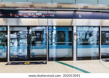 DUBAI, UAE - NOVEMBER 2: Interior of metro station in Dubai. Metro as world\'s longest fully automated metro network (75 km) on November 2, 2013, Dubai, UAE.
