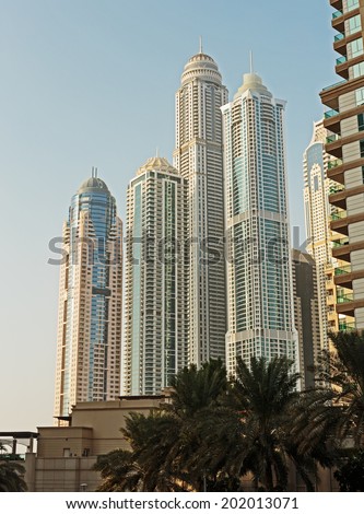 DUBAI, UAE - NOVEMBER 2: Modern buildings in Dubai, on November 2, 2013, Dubai, UAE. Dubai was the fastest developing city in the world between 2002 and 2008.
