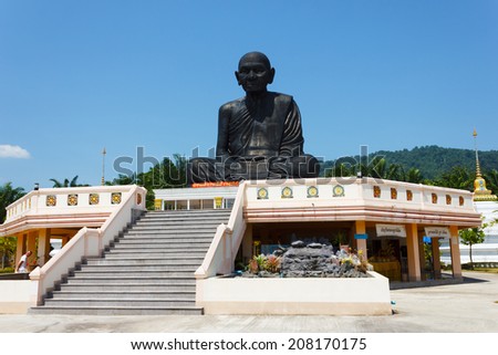 PHUKET, THAILAND - FEBRUARY 12, 2013: Black monk statue in the south of Thailand