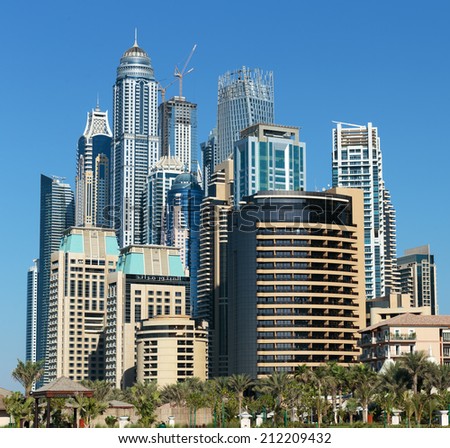 DUBAI, UAE - NOVEMBER 11: Modern buildings in Dubai Marina, on November 11, 2013, Dubai, UAE. In the city of artificial channel length of 3 kilometers along the Persian Gulf.