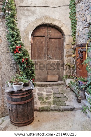 Entrance to the old French house with flowers