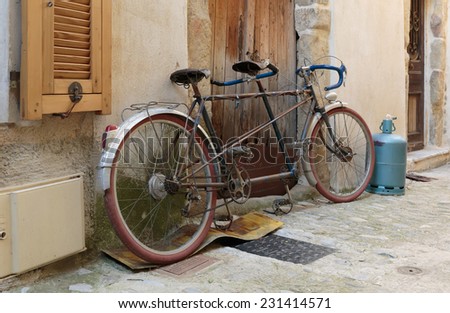Bicycle on the old street in the village Coaraze, France