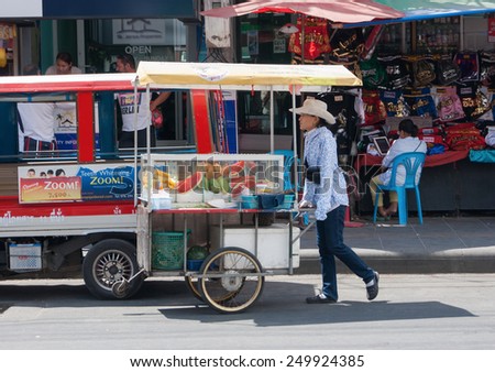 PHUKET, THAILAND - FEBRUARY 15, 2013: Seller food with a cart on the street
