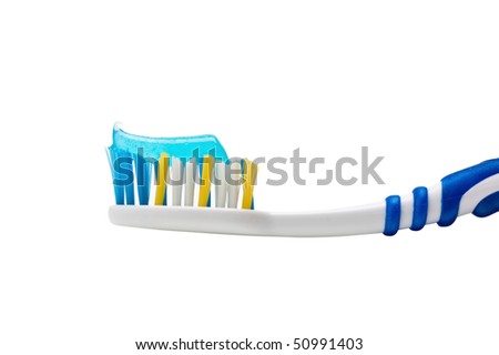 toothbrush and toothpaste isolated on a white background