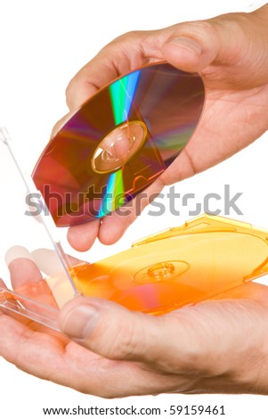 Men\'s hand holding DVD CD disc isolated  on white background