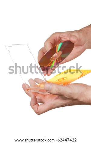 Men\'s hand holding DVD CD disc isolated  on white background