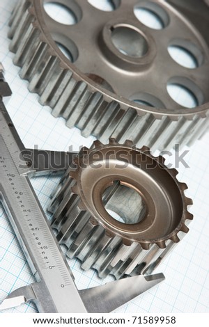 gears and caliper on graph paper