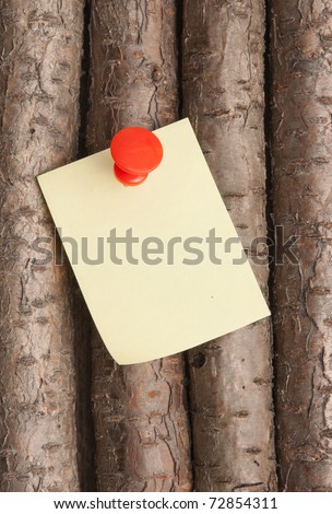 reminder notes on a background of the old wooden logs