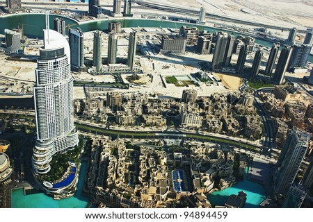 DUBAI, UAE. - OCTOBER 13 : Dubai, the top view on Dubai downtown from the tallest building in the world, Burj Khalifa, at 828m. on October 13, 2011 in Dubai, UAE. Day View