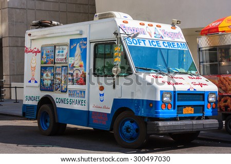 White and blue ice cream truck on a street in New York City - July 10, 2015, 89th street in front of Guggenheim museum, New York City, NY, USA