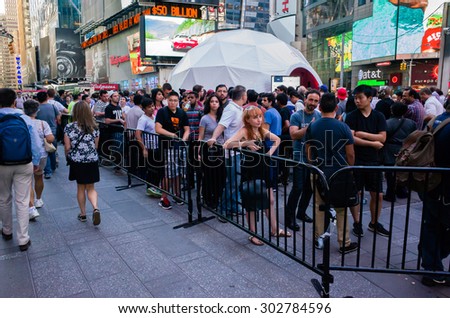 People waiting in line for OnePlus 2 smart phone event on Times Square in New York City - July 31, 2015, Times Square, New York City, NY, USA