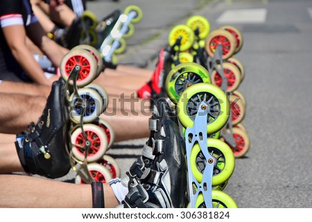 Roller skates wheels before the start of city race for healthy and active life