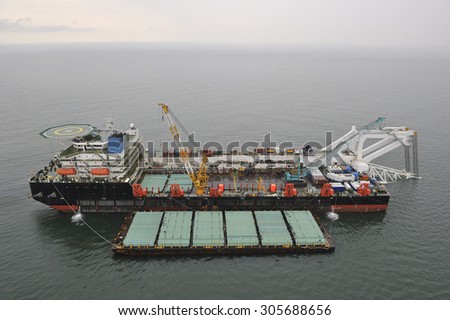The cargo ship with the crane, the top view.