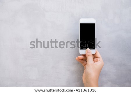 Woman hands with wall cell phone, mock up