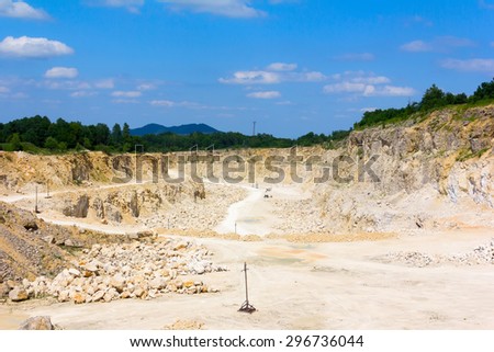 the blue sky over calcareous stone quarries in summertime