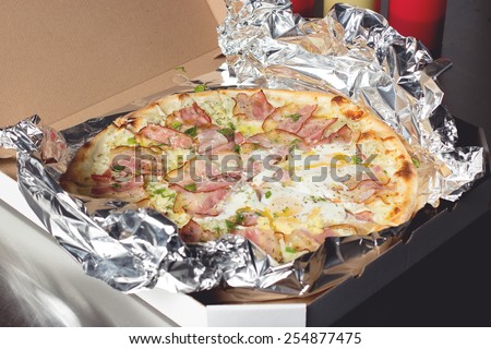Freshly cooked  meat pizza with eggs pizza to delivery