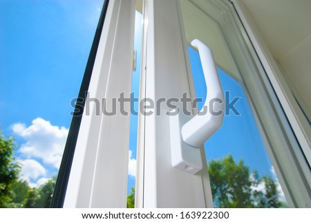 open plastic vinyl window on a background blue sky