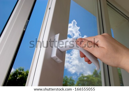open plastic window on a background blue sky