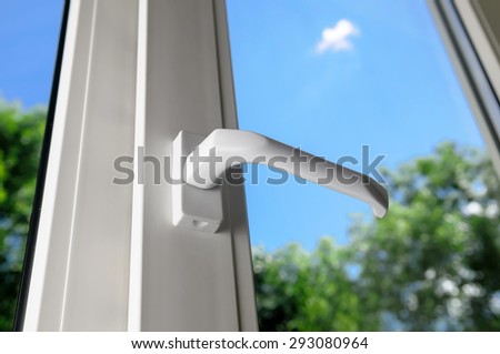 close plastic vinyl window on a background blue sky