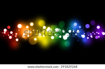 Festive rainbow gradient  background with defocused lights.