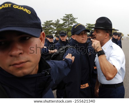 A Coast Guard company commander, disciplines a Seaman Recruit of recruit company Golf-178 Tuesday, Sept. 11, 2007, at Coast Guard Training Center Cape May, N.J.