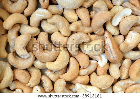 Full frame of peeled cashew nuts. Close up.