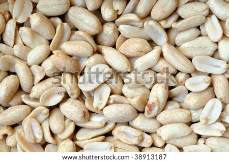 Full frame of peeled groundnuts. Close up.