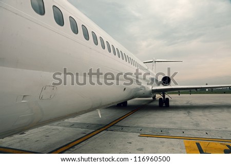Commercial airplane parking in airport