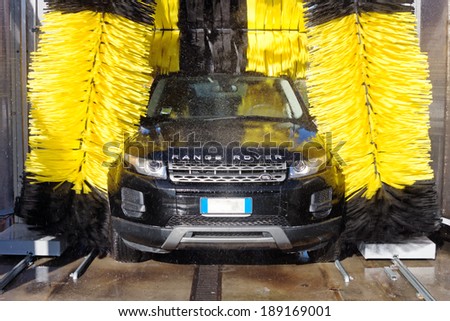 MILAN, ITALY - CIRCA FEBRUARY 2014: new Range Rover Evoque in car wash. The Evoque is the smallest Range Rover ever built.