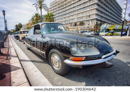 NICE, FRANCE - APRIL 26, 2014: A classic Citroen car during the 11th CitroLevens parade, here on the promenade des angles in Nice.