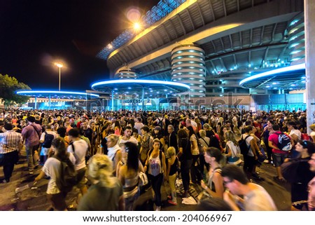MILAN, ITALY - CIRCA july 2014: Crowd of people outside San Siro football stadium. Stadium is the home of the teams Milan and Inter.